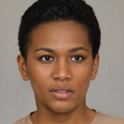 Neutral black young-adult female with short  brown hair and brown eyes