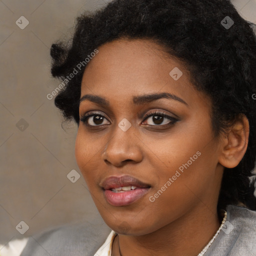 Joyful black young-adult female with medium  black hair and brown eyes