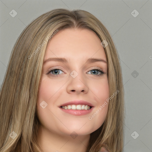 Joyful white young-adult female with long  brown hair and green eyes