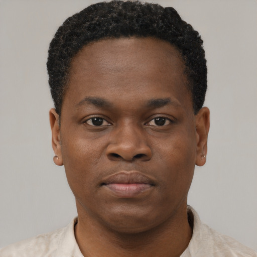 Neutral black young-adult male with short  brown hair and brown eyes