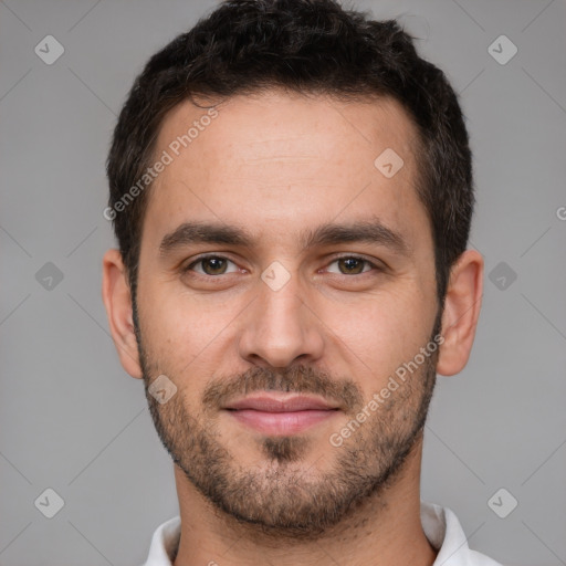 Joyful white young-adult male with short  brown hair and brown eyes