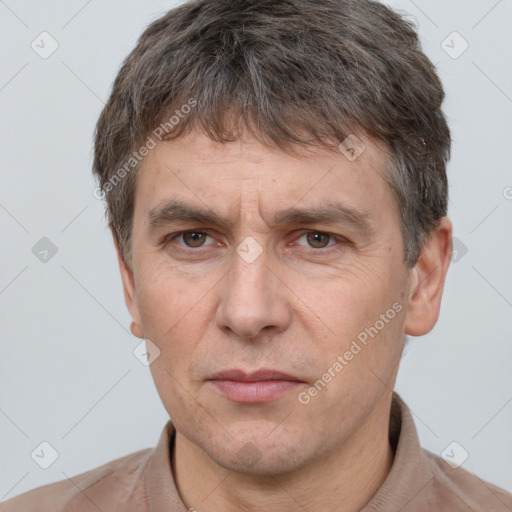 Neutral white adult male with short  brown hair and brown eyes