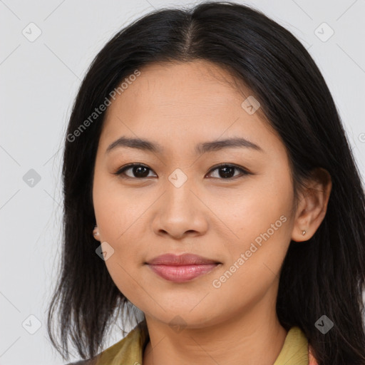 Joyful asian young-adult female with long  brown hair and brown eyes