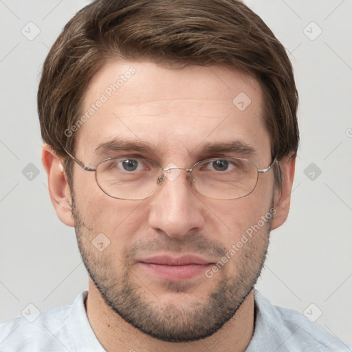 Joyful white adult male with short  brown hair and grey eyes