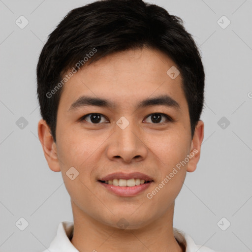 Joyful white young-adult male with short  black hair and brown eyes