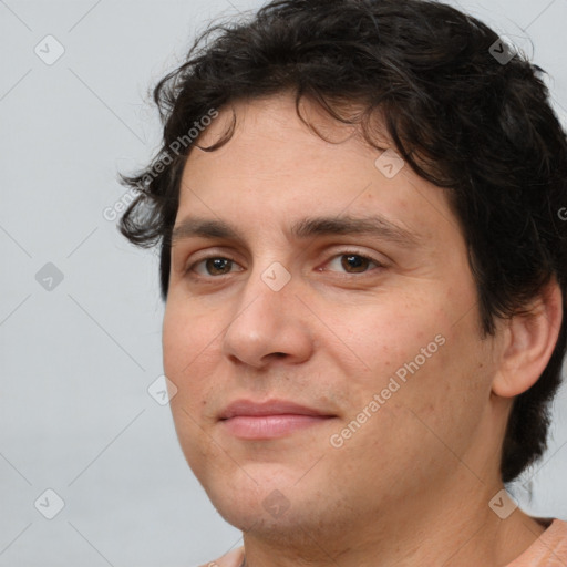 Joyful white young-adult male with medium  brown hair and brown eyes