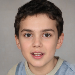 Joyful white child male with short  brown hair and brown eyes