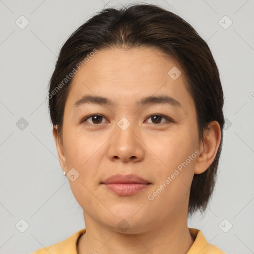 Joyful white young-adult female with medium  brown hair and brown eyes