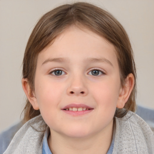 Joyful white child female with medium  brown hair and brown eyes