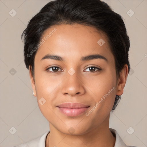 Joyful latino young-adult female with short  brown hair and brown eyes