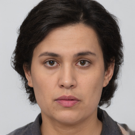 Neutral white adult female with medium  brown hair and brown eyes