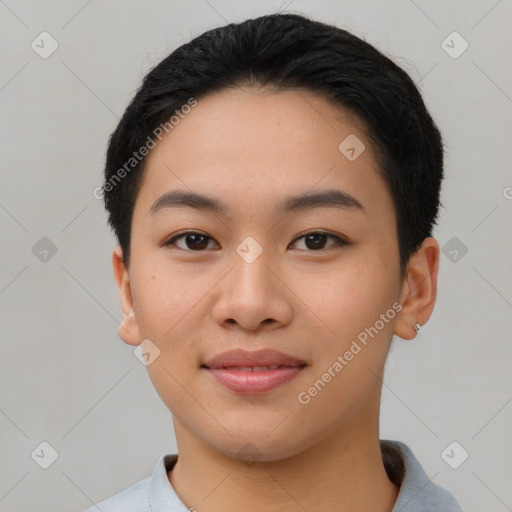 Joyful asian young-adult female with short  black hair and brown eyes