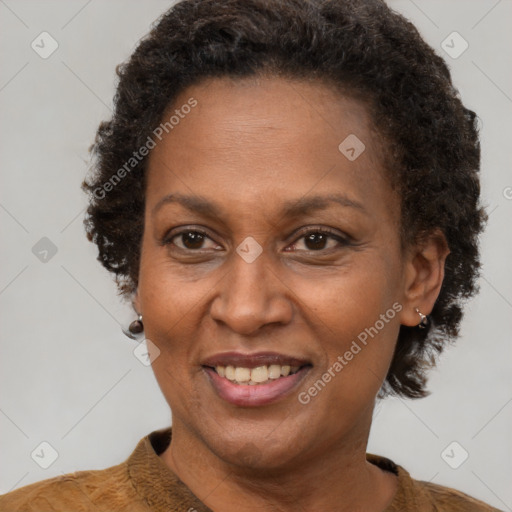 Joyful black adult female with short  brown hair and brown eyes