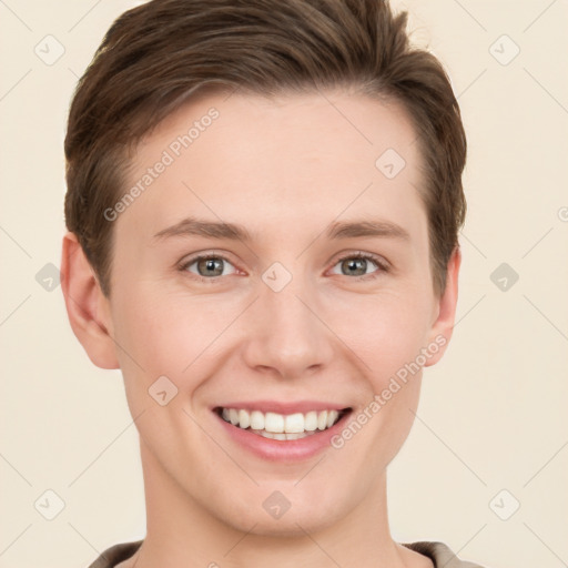 Joyful white young-adult female with short  brown hair and grey eyes