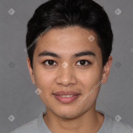 Joyful asian young-adult male with short  brown hair and brown eyes