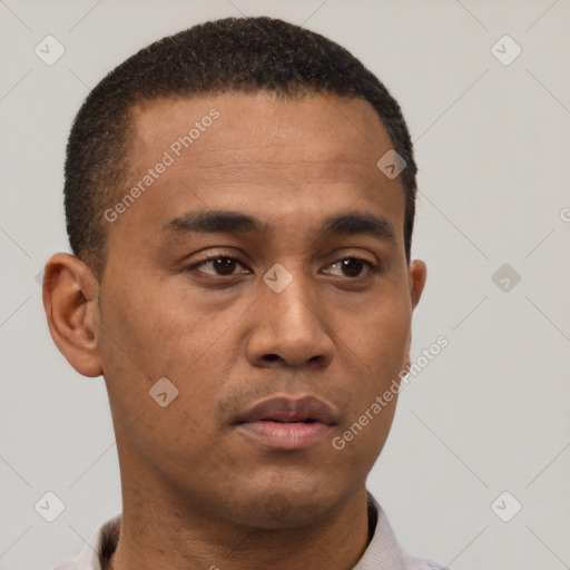Neutral latino young-adult male with short  brown hair and brown eyes