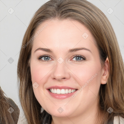 Joyful white young-adult female with long  brown hair and grey eyes