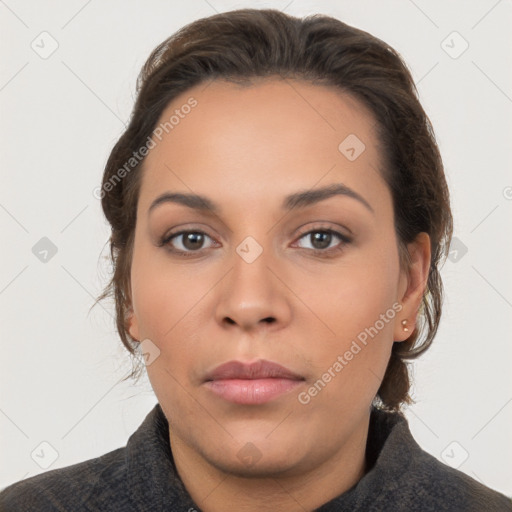 Neutral white young-adult female with medium  brown hair and brown eyes