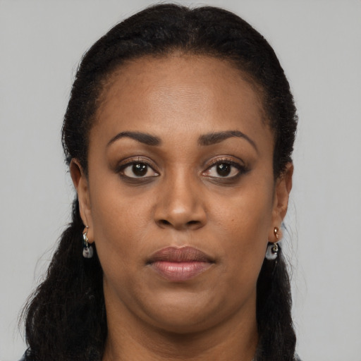 Neutral black young-adult female with long  black hair and brown eyes