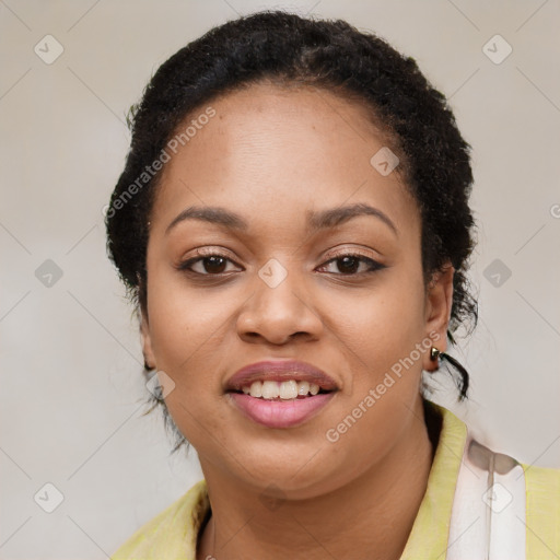 Joyful black young-adult female with short  black hair and brown eyes