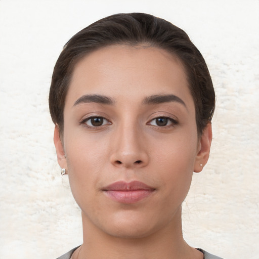 Neutral white young-adult female with short  brown hair and brown eyes