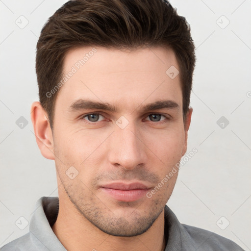 Neutral white young-adult male with short  brown hair and brown eyes