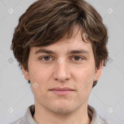 Neutral white young-adult male with short  brown hair and grey eyes