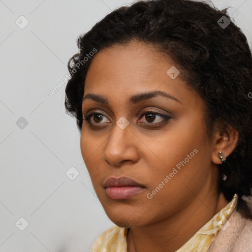 Neutral latino young-adult female with long  brown hair and brown eyes