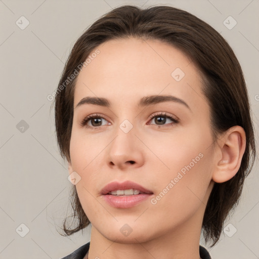 Neutral white young-adult female with medium  brown hair and brown eyes