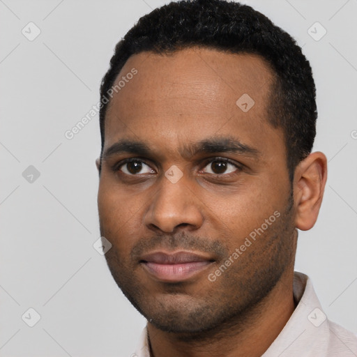 Neutral black young-adult male with short  black hair and brown eyes