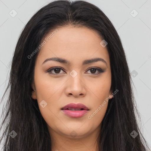 Joyful asian young-adult female with long  brown hair and brown eyes