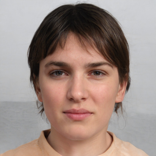 Neutral white young-adult female with medium  brown hair and brown eyes