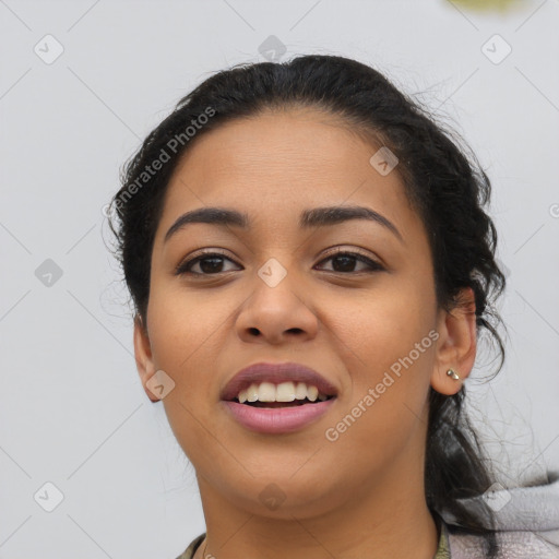 Joyful latino young-adult female with medium  black hair and brown eyes