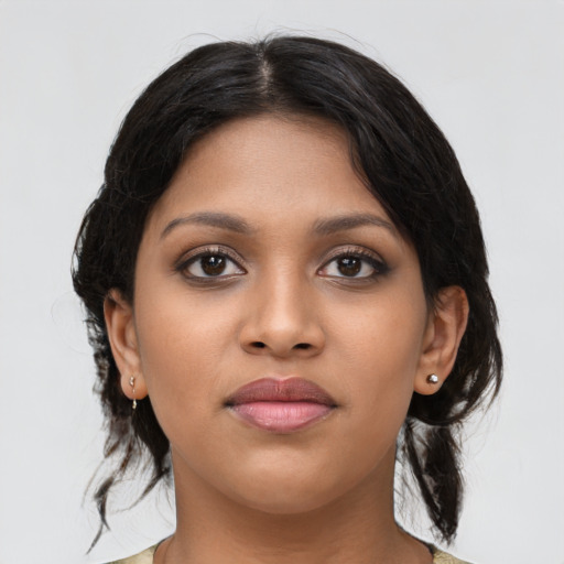 Neutral latino young-adult female with medium  black hair and brown eyes