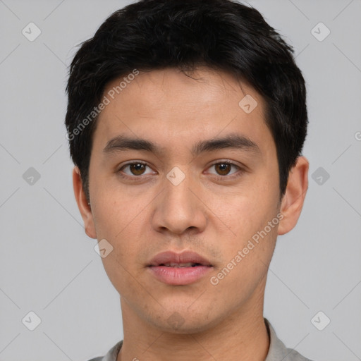 Neutral white young-adult male with short  black hair and brown eyes