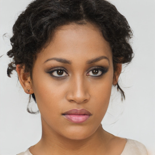 Neutral latino young-adult female with short  brown hair and brown eyes