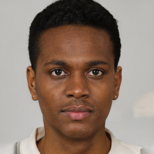 Neutral black young-adult male with short  brown hair and brown eyes