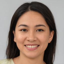 Joyful white young-adult female with medium  brown hair and brown eyes