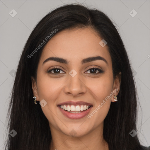 Joyful latino young-adult female with long  brown hair and brown eyes