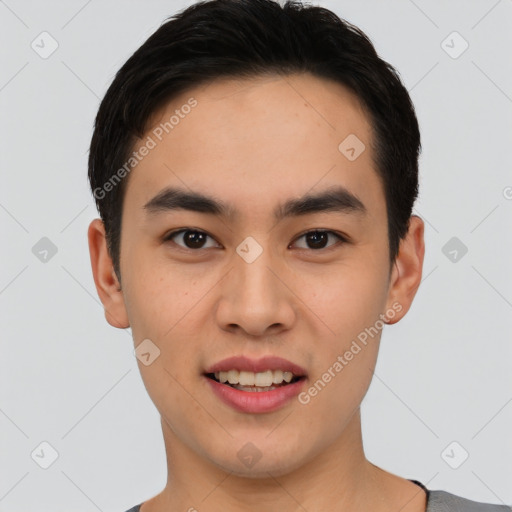 Joyful asian young-adult male with short  black hair and brown eyes