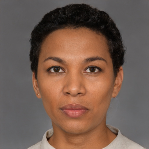 Neutral latino young-adult female with short  black hair and brown eyes