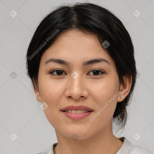 Joyful asian young-adult female with medium  brown hair and brown eyes