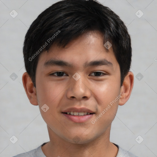 Joyful asian child male with short  brown hair and brown eyes