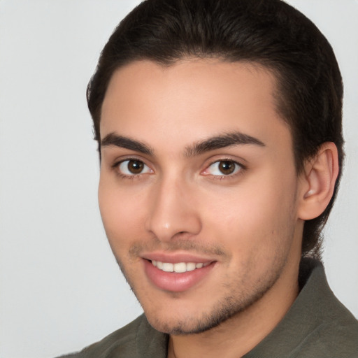 Joyful white young-adult male with short  brown hair and brown eyes