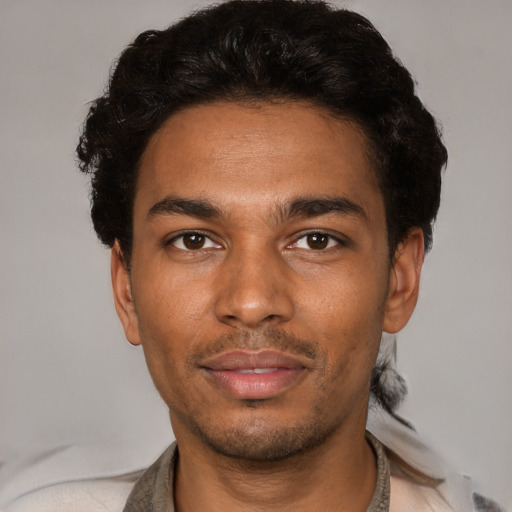 Neutral black young-adult male with short  brown hair and brown eyes