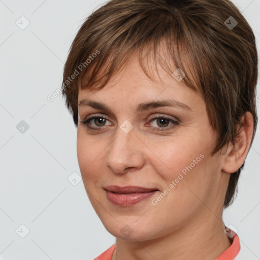 Joyful white adult female with medium  brown hair and brown eyes