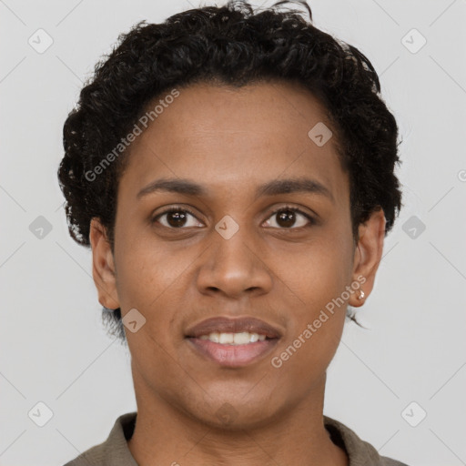 Joyful black young-adult female with short  brown hair and brown eyes