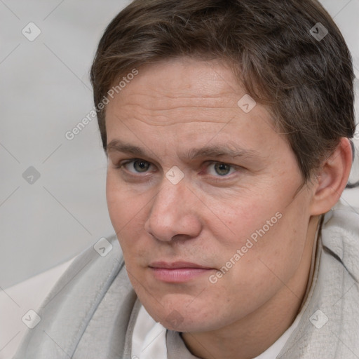 Neutral white adult male with short  brown hair and brown eyes