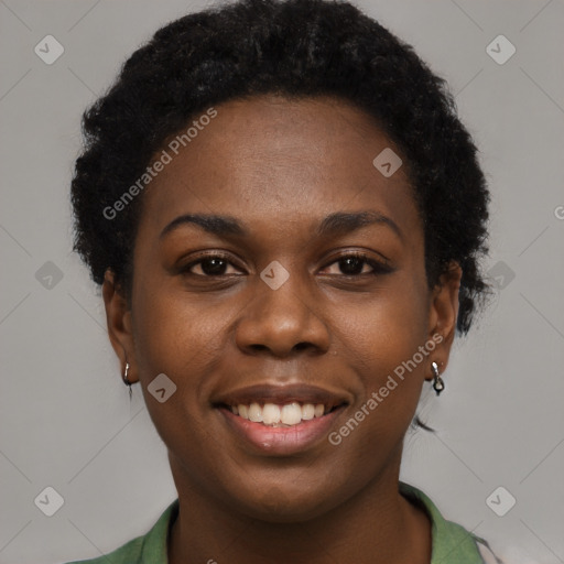 Joyful black young-adult female with short  black hair and brown eyes