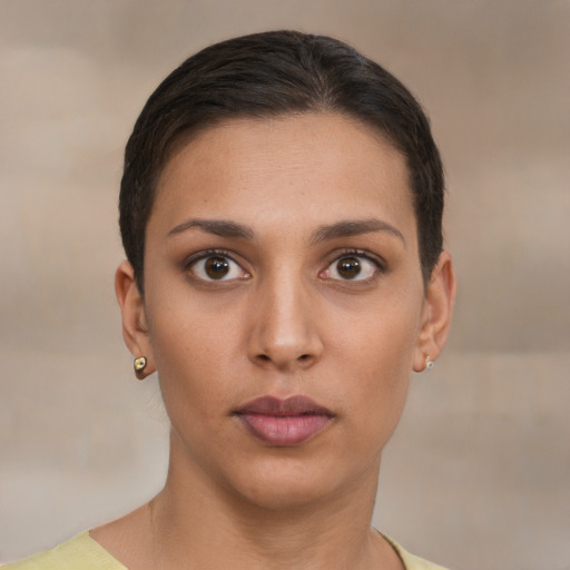 Neutral white young-adult female with short  brown hair and brown eyes